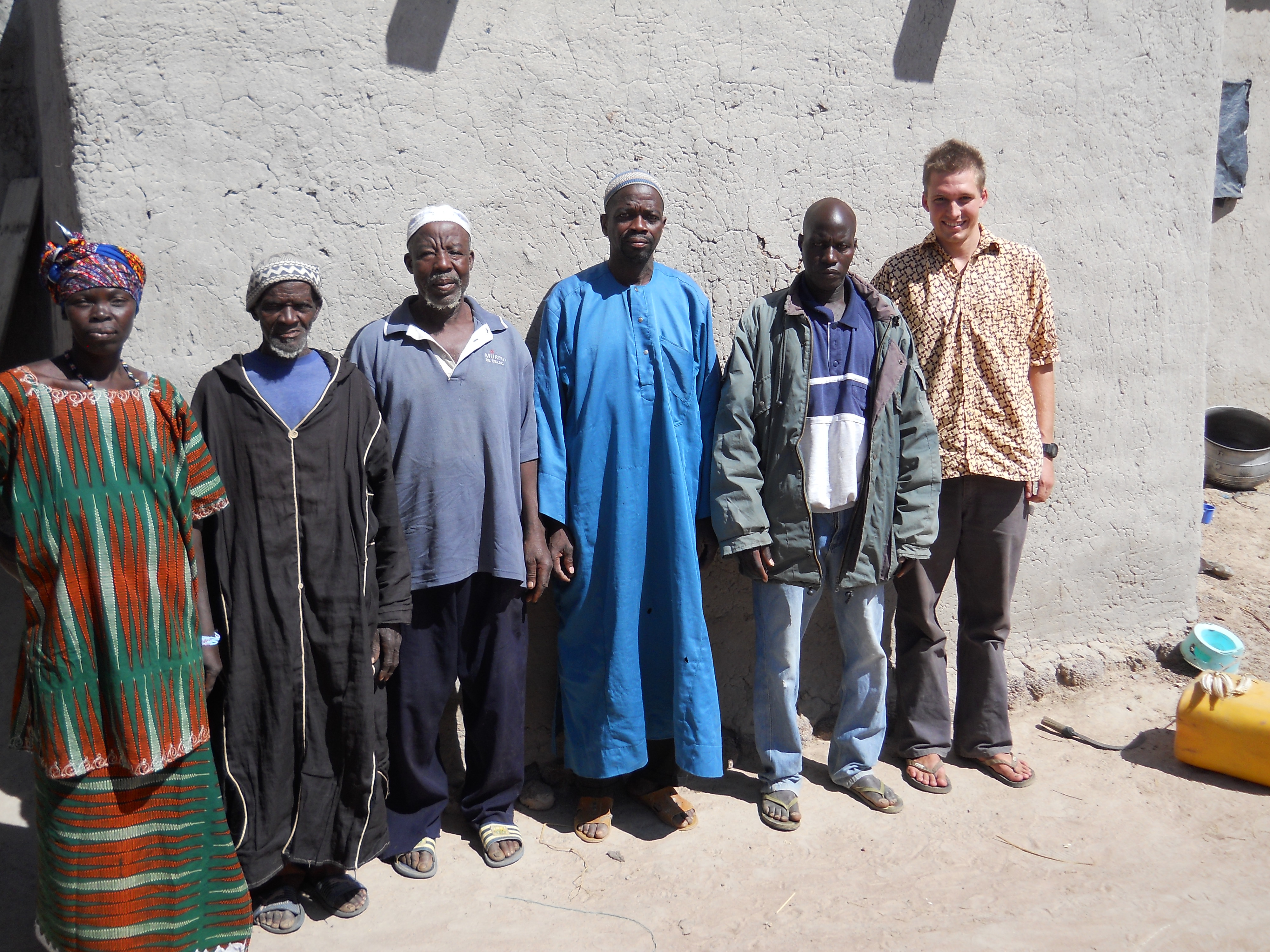 The village big-cheeses. My host father Yaya is in the black and my work-counterpart Siaka is in the jacket. The village leader is in the blue robe – he threw that on to class-up our photo.